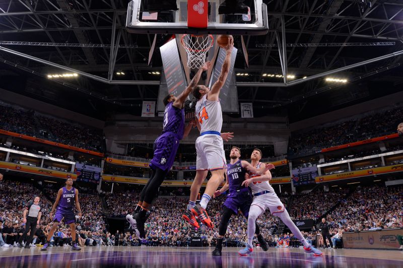 SACRAMENTO, CA - MARCH 16: Bojan Bogdanovic #44 of the New York Knicks drives to the basket during the game against the Sacramento Kings on March 16, 2024 at Golden 1 Center in Sacramento, California. NOTE TO USER: User expressly acknowledges and agrees that, by downloading and or using this Photograph, user is consenting to the terms and conditions of the Getty Images License Agreement. Mandatory Copyright Notice: Copyright 2024 NBAE (Photo by Rocky Widner/NBAE via Getty Images)