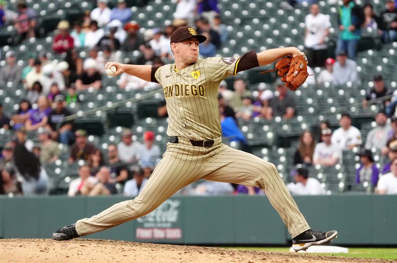 Apr 25, 2024; Denver, Colorado, USA; San Diego Padres pitcher Stephen Kolek (32) delivers a pitch in seventh inning against the Colorado Rockies at Coors Field. Mandatory Credit: Ron Chenoy-USA TODAY Sports