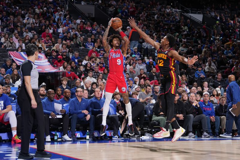 PHILADELPHIA, PA - FEBRUARY 9: Kelly Oubre Jr. #9 of the Philadelphia 76ers shoots the ball during the game against the Atlanta Hawks on February 9, 2024 at the Wells Fargo Center in Philadelphia, Pennsylvania NOTE TO USER: User expressly acknowledges and agrees that, by downloading and/or using this Photograph, user is consenting to the terms and conditions of the Getty Images License Agreement. Mandatory Copyright Notice: Copyright 2024 NBAE (Photo by Jesse D. Garrabrant/NBAE via Getty Images)