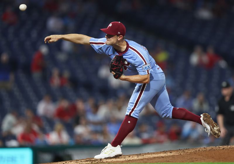 Sep 25, 2025; Philadelphia, Pennsylvania, USA; Philadelphia Phillies pitcher David Robertson (30) throws a pitch during the ninth inning against the Miami Marlins at Citizens Bank Park. Mandatory Credit: Bill Streicher-Imagn Images