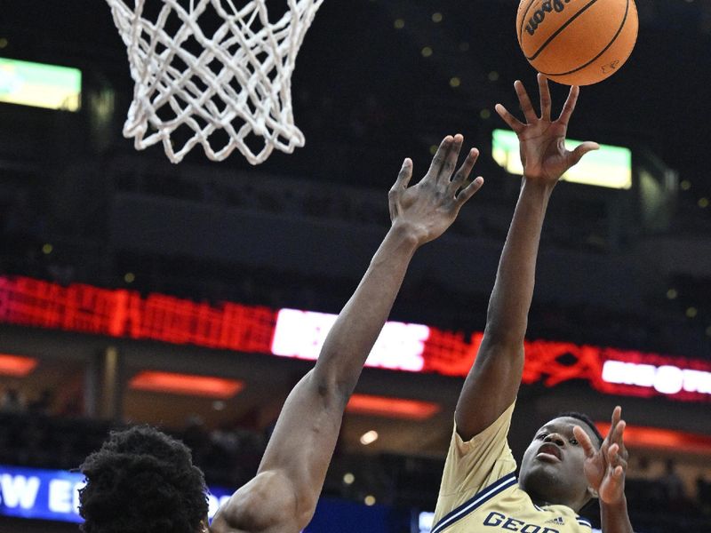 Feb 10, 2024; Louisville, Kentucky, USA; Georgia Tech Yellow Jackets guard Kowacie Reeves Jr. (14) shoots against Louisville Cardinals forward Emmanuel Okorafor (34) during the first half at KFC Yum! Center. Mandatory Credit: Jamie Rhodes-USA TODAY Sports