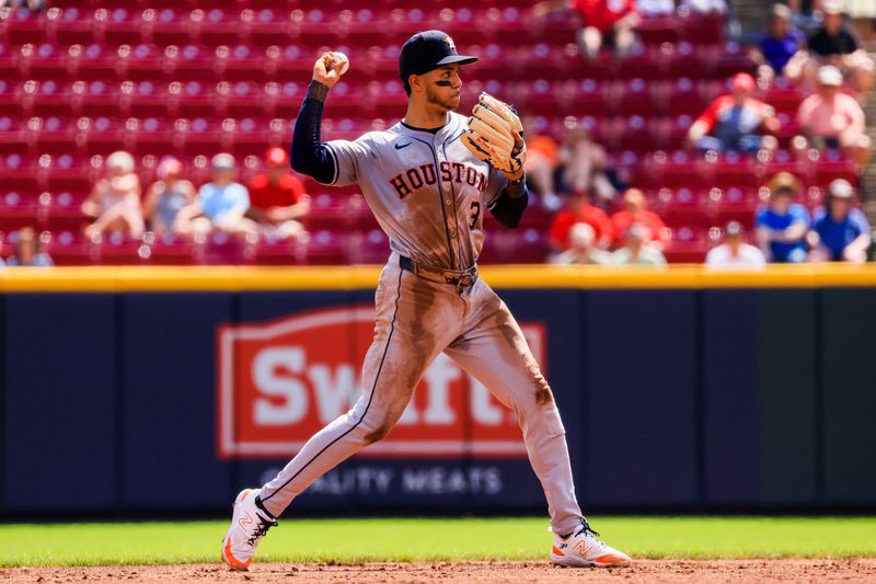 Sep 5, 2024; Cincinnati, Ohio, USA; Houston Astros shortstop Jeremy Pena (3) throws to first to get Cincinnati Reds designated hitter Amed Rosario (not pictured) out in the third inning at Great American Ball Park. Mandatory Credit: Katie Stratman-Imagn Images