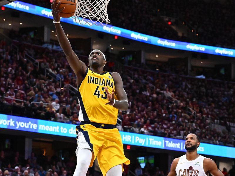 CLEVELAND, OHIO - MAY 04: Pascal Siakam #43 of the Indiana Pacers shoots over Evan Mobley #4 of the Cleveland Cavaliers during the fourth quarter of game one of the Eastern Conference Semifinals at Rocket Arena on May 04, 2025 in Cleveland, Ohio. The Pacers defeated the Cavaliers 121-112. NOTE TO USER: User expressly acknowledges and agrees that, by downloading and or using this photograph, User is consenting to the terms and conditions of the Getty Images License Agreement. (Photo by Jason Miller/Getty Images)
