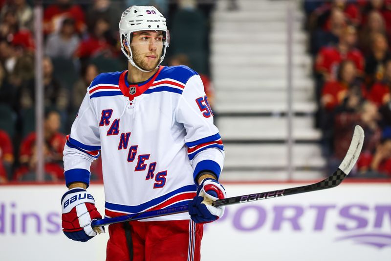 Nov 21, 2024; Calgary, Alberta, CAN; New York Rangers left wing Will Cuylle (50) during the third period against the Calgary Flames at Scotiabank Saddledome. Mandatory Credit: Sergei Belski-Imagn Images