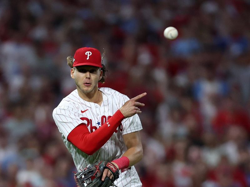 Oct 4, 2023; Philadelphia, Pennsylvania, USA; Philadelphia Phillies first baseman Alec Bohm (28) makes a throw to first base against the Miami Marlins during the third inning for game two of the Wildcard series for the 2023 MLB playoffs at Citizens Bank Park. Mandatory Credit: Bill Streicher-USA TODAY Sports