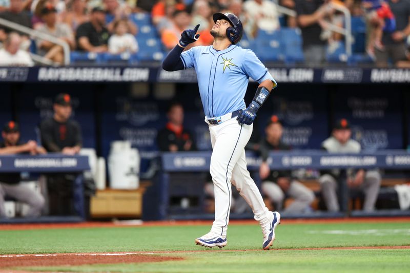 Apr 14, 2024; St. Petersburg, Florida, USA;  Tampa Bay Rays catcher René Pinto (50) runs the bases after hitting a three run home run against the San Francisco Giants in the fourth inning at Tropicana Field. Mandatory Credit: Nathan Ray Seebeck-USA TODAY Sports