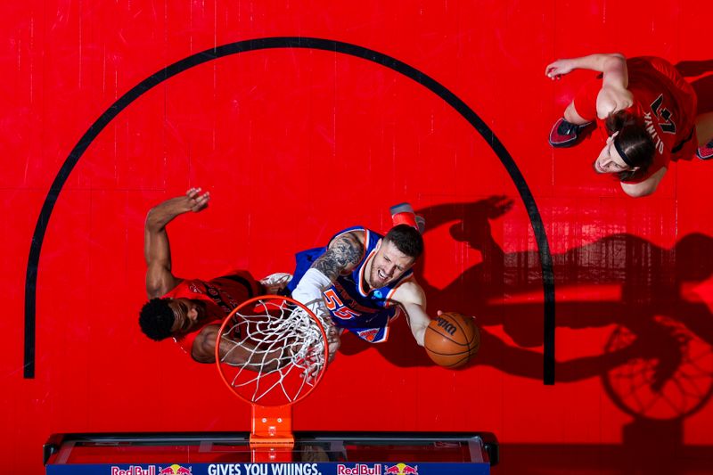 TORONTO, CANADA - MARCH 27: Isaiah Hartenstein #55 of the New York Knicks drives to the basket during the game against the Toronto Raptors on March 27, 2024 at the Scotiabank Arena in Toronto, Ontario, Canada.  NOTE TO USER: User expressly acknowledges and agrees that, by downloading and or using this Photograph, user is consenting to the terms and conditions of the Getty Images License Agreement.  Mandatory Copyright Notice: Copyright 2024 NBAE (Photo by Vaughn Ridley/NBAE via Getty Images)