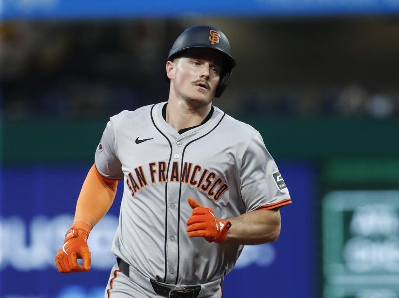May 22, 2024; Pittsburgh, Pennsylvania, USA;  San Francisco Giants third baseman Matt Chapman (26) circles the bases after hitting a two run home run against Pittsburgh Pirates during the sixth inning at PNC Park. Mandatory Credit: Charles LeClaire-USA TODAY Sports