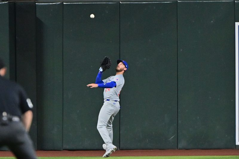 Apr 17, 2024; Phoenix, Arizona, USA;  Chicago Cubs outfielder Cody Bellinger (24) catches a fly ball in the fourth inning against the Arizona Diamondbacks at Chase Field. Mandatory Credit: Matt Kartozian-USA TODAY Sports