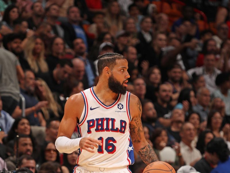 MIAMI, FL - NOVEMBER 18: Caleb Martin #16 of the Philadelphia 76ers dribbles the ball during the game against the Miami Heat on November 18, 2024 at Kaseya Center in Miami, Florida. NOTE TO USER: User expressly acknowledges and agrees that, by downloading and or using this Photograph, user is consenting to the terms and conditions of the Getty Images License Agreement. Mandatory Copyright Notice: Copyright 2024 NBAE (Photo by Issac Baldizon/NBAE via Getty Images)