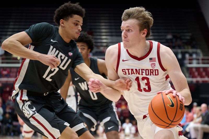 Jan 18, 2024; Stanford, California, USA; Stanford Cardinal guard Michael Jones (13) dribbles the ball against Washington State Cougars guard Isaiah Watts (12) during the first half at Maples Pavilion. Mandatory Credit: Robert Edwards-USA TODAY Sports