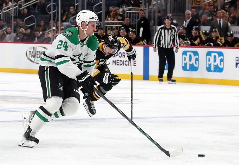 Nov 11, 2024; Pittsburgh, Pennsylvania, USA;  Dallas Stars center Roope Hintz (24) skates with the puck on a breakaway against the Pittsburgh Penguins during the second period at PPG Paints Arena. Mandatory Credit: Charles LeClaire-Imagn Images