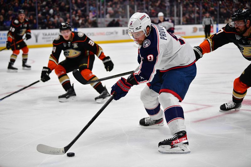 Feb 21, 2024; Anaheim, California, USA; Columbus Blue Jackets defenseman Ivan Provorov (9) moves in for a shot on goal ahead of Anaheim Ducks left wing Alex Killorn (17) during the second period at Honda Center. Mandatory Credit: Gary A. Vasquez-USA TODAY Sports