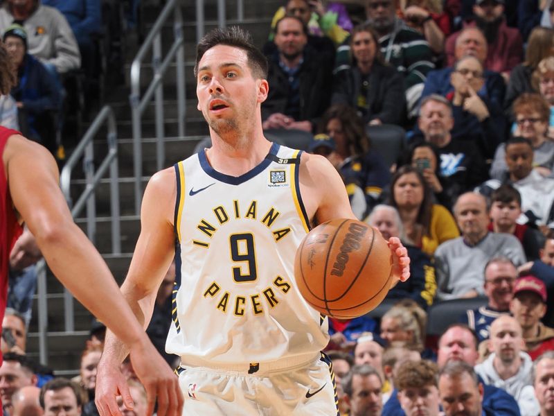 INDIANAPOLIS, IN - MARCH 18:  T.J. McConnell #9 of the Indiana Pacers handles the ball during the game  on March 18, 2024 at Gainbridge Fieldhouse in Indianapolis, Indiana. NOTE TO USER: User expressly acknowledges and agrees that, by downloading and or using this Photograph, user is consenting to the terms and conditions of the Getty Images License Agreement. Mandatory Copyright Notice: Copyright 2024 NBAE (Photo by Ron Hoskins/NBAE via Getty Images)