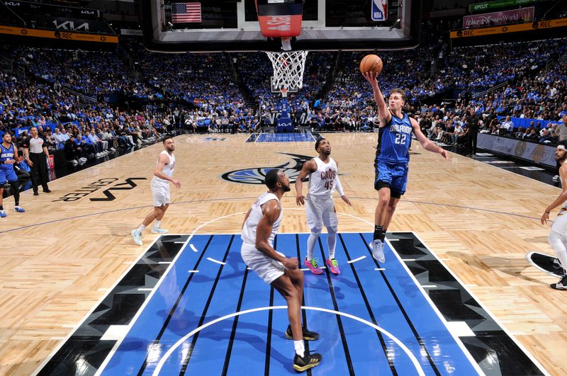 ORLANDO, FL - APRIL 25: Franz Wagner #22 of the Orlando Magic goes to the basket during the game against the Cleveland Cavaliers during Round 1 Game 3 of the 2024 NBA Playoffs on April 25, 2024 at Kia Center in Orlando, Florida. NOTE TO USER: User expressly acknowledges and agrees that, by downloading and or using this photograph, User is consenting to the terms and conditions of the Getty Images License Agreement. Mandatory Copyright Notice: Copyright 2023 NBAE (Photo by Fernando Medina/NBAE via Getty Images)