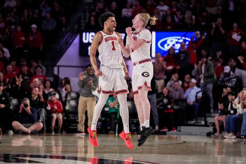 Jan 31, 2024; Athens, Georgia, USA; Georgia Bulldogs guards Jabri Abdur-Rahim (1) and  Blue Cain (0) react  during the game against the Alabama Crimson Tide during the first half at Stegeman Coliseum. Mandatory Credit: Dale Zanine-USA TODAY Sports