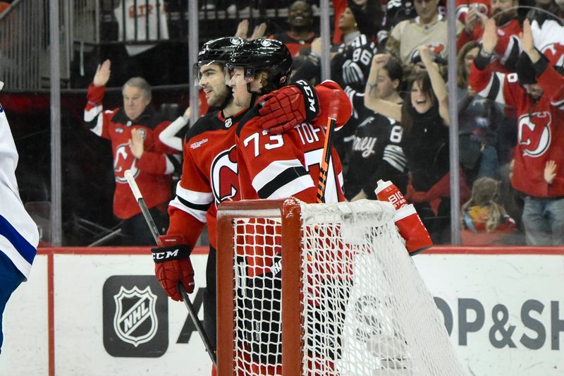 Feb 25, 2024; Newark, New Jersey, USA; New Jersey Devils right wing Tyler Toffoli (73) reacts after scoring a goal against the Tampa Bay Lightning during the second period at Prudential Center. Mandatory Credit: John Jones-USA TODAY Sports