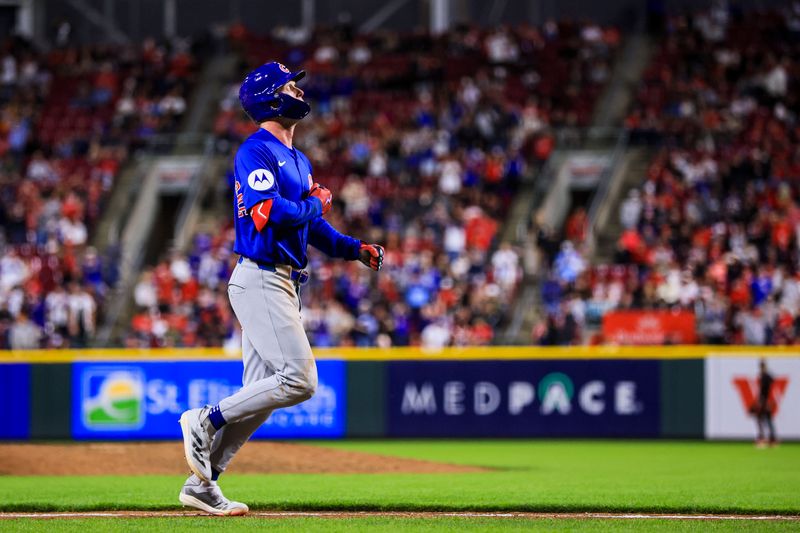 May 23, 2025; Cincinnati, Ohio, USA; Chicago Cubs outfielder Pete Crow-Armstrong (4) reacts after hitting a grand slam in the seventh inning against the Cincinnati Reds at Great American Ball Park. Mandatory Credit: Katie Stratman-Imagn Images