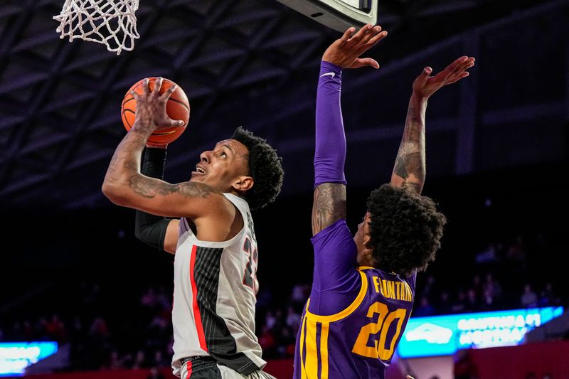 Feb 14, 2023; Athens, Georgia, USA; Georgia Bulldogs center Braelen Bridges (23) shoots against LSU Tigers forward Derek Fountain (20) during the second half at Stegeman Coliseum. Mandatory Credit: Dale Zanine-USA TODAY Sports