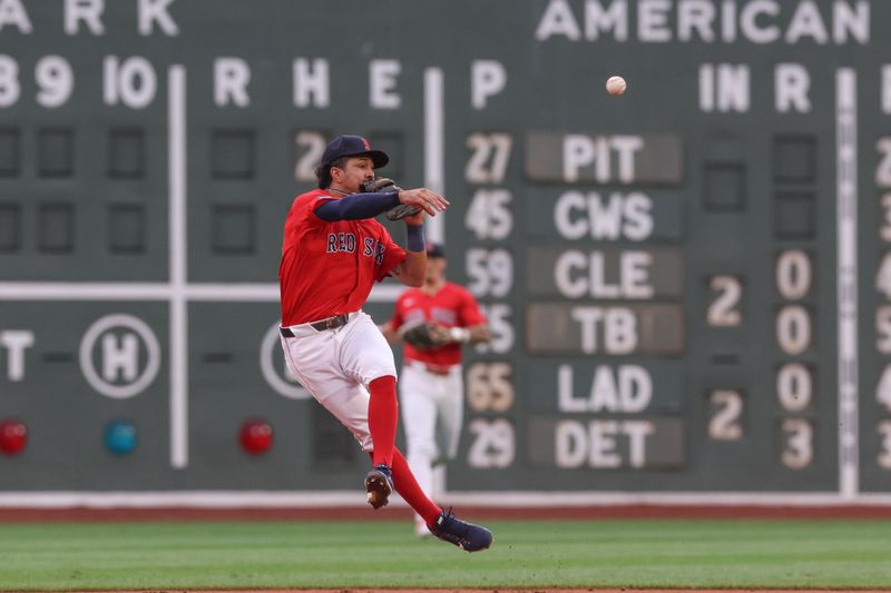 Jul 12, 2024; Boston, Massachusetts, USA; Boston Red Sox shortstop David Hamilton (70) throws to first during the first inning against the Kansas City Royals at Fenway Park. Mandatory Credit: Paul Rutherford-USA TODAY Sports