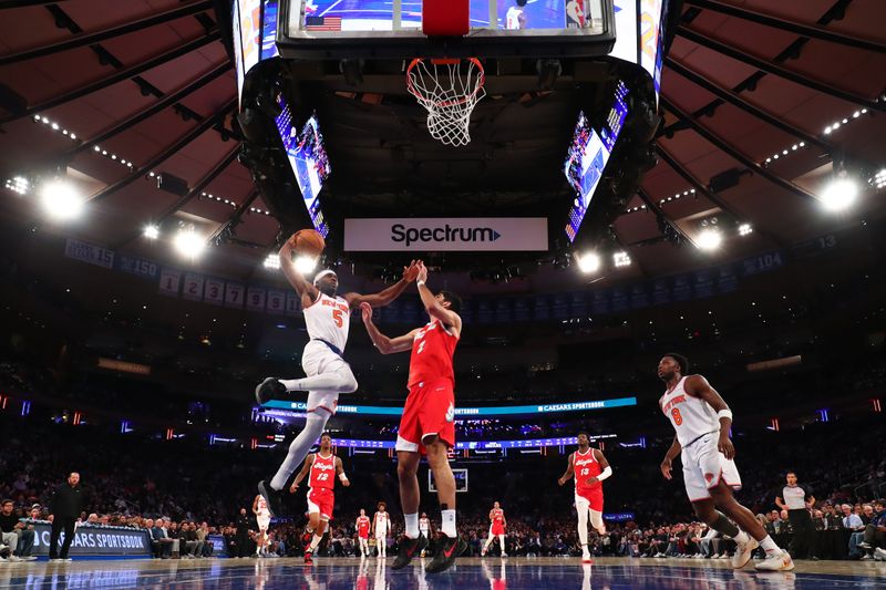 NEW YORK, NY - JANUARY 27: Precious Achiuwa #5 of the New York Knicks drives to the basket during the game against the Memphis Grizzlies on January 27, 2025 at Madison Square Garden in New York City, New York.  NOTE TO USER: User expressly acknowledges and agrees that, by downloading and or using this photograph, User is consenting to the terms and conditions of the Getty Images License Agreement. Mandatory Copyright Notice: Copyright 2025 NBAE  (Photo by David L. Nemec/NBAE via Getty Images)