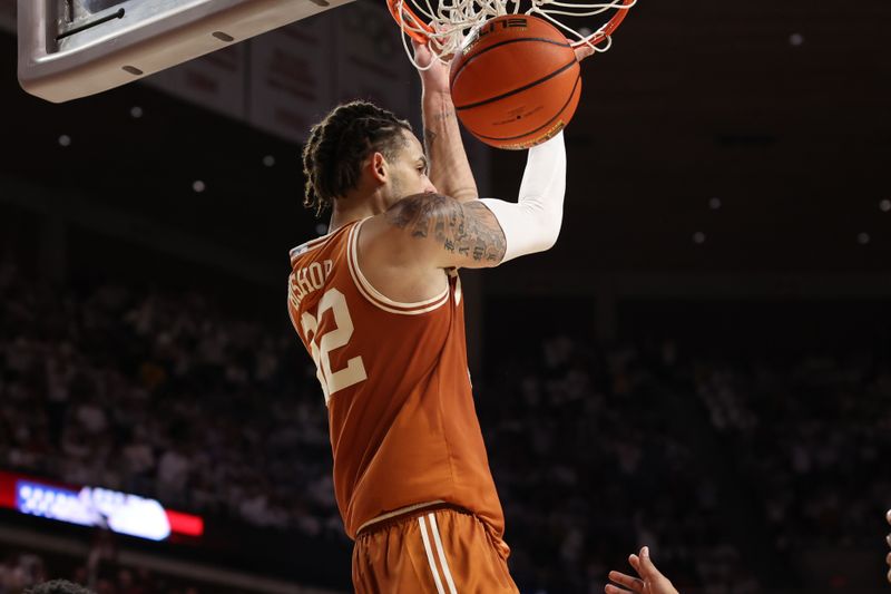 Jan 17, 2023; Ames, Iowa, USA; Texas Longhorns forward Christian Bishop (32) scores against the Iowa State Cyclones during the second half at James H. Hilton Coliseum. Mandatory Credit: Reese Strickland-USA TODAY Sports