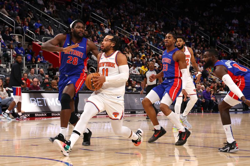 DETROIT, MICHIGAN - NOVEMBER 01: Jalen Brunson #11 of the New York Knicks drives to the basket past Isaiah Stewart #28 of the Detroit Pistons during the second half at Little Caesars Arena on November 01, 2024 in Detroit, Michigan. NOTE TO USER: User expressly acknowledges and agrees that, by downloading and or using this photograph, User is consenting to the terms and conditions of the Getty Images License. (Photo by Gregory Shamus/Getty Images)