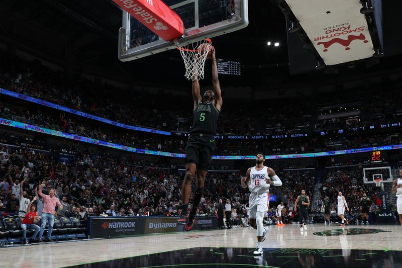 NEW ORLEANS, LA - MARCH 15: Herb Jones #5 of the New Orleans Pelicans dunks the ball during the game against the LA Clippers on March 15, 2024 at the Smoothie King Center in New Orleans, Louisiana. NOTE TO USER: User expressly acknowledges and agrees that, by downloading and or using this Photograph, user is consenting to the terms and conditions of the Getty Images License Agreement. Mandatory Copyright Notice: Copyright 2024 NBAE (Photo by Layne Murdoch Jr./NBAE via Getty Images)