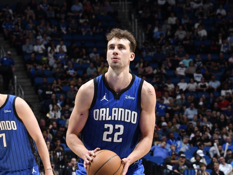 ORLANDO, FL - FEBRUARY 29: Franz Wagner #22 of the Orlando Magic shoots a free throw during the game against the Utah Jazz on February 29, 2024 at Amway Center in Orlando, Florida. NOTE TO USER: User expressly acknowledges and agrees that, by downloading and or using this photograph, User is consenting to the terms and conditions of the Getty Images License Agreement. Mandatory Copyright Notice: Copyright 2024 NBAE (Photo by Fernando Medina/NBAE via Getty Images)