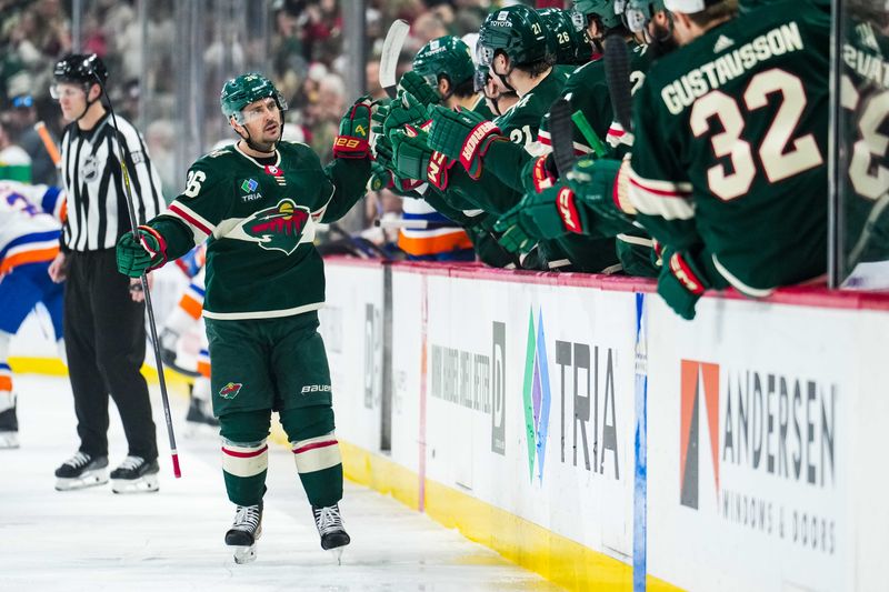 Jan 15, 2024; Saint Paul, Minnesota, USA; Minnesota Wild right wing Mats Zuccarello (36) celebrates his goal with teammates during the first period against the New York Islanders at Xcel Energy Center. Mandatory Credit: Brace Hemmelgarn-USA TODAY Sports