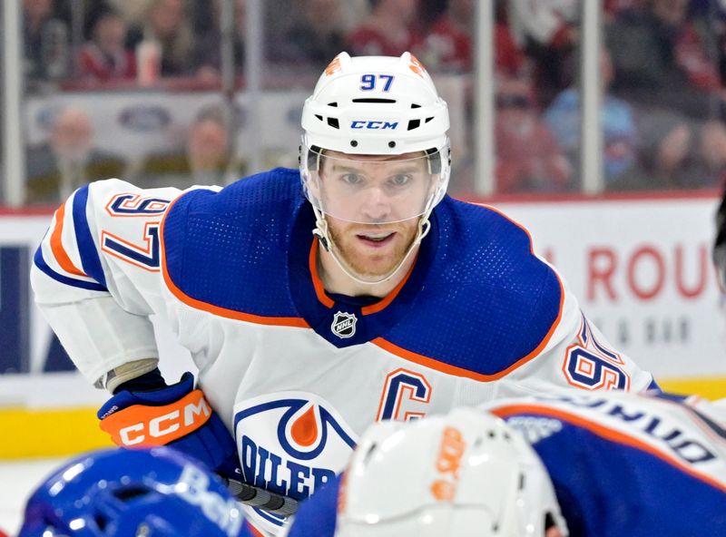 Jan 13, 2024; Montreal, Quebec, CAN; Edmonton Oilers forward Connor McDavid (97) prepares for a face off against the Montreal Canadiens during the third period at the Bell Centre. Mandatory Credit: Eric Bolte-USA TODAY Sports