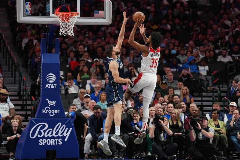 DALLAS, TX - FEBRUARY 12: Marvin Bagley III #35 of the Washington Wizards drives to the basket during the game against the Dallas Mavericks on February 12, 2024 at the American Airlines Center in Dallas, Texas. NOTE TO USER: User expressly acknowledges and agrees that, by downloading and or using this photograph, User is consenting to the terms and conditions of the Getty Images License Agreement. Mandatory Copyright Notice: Copyright 2024 NBAE (Photo by Glenn James/NBAE via Getty Images)