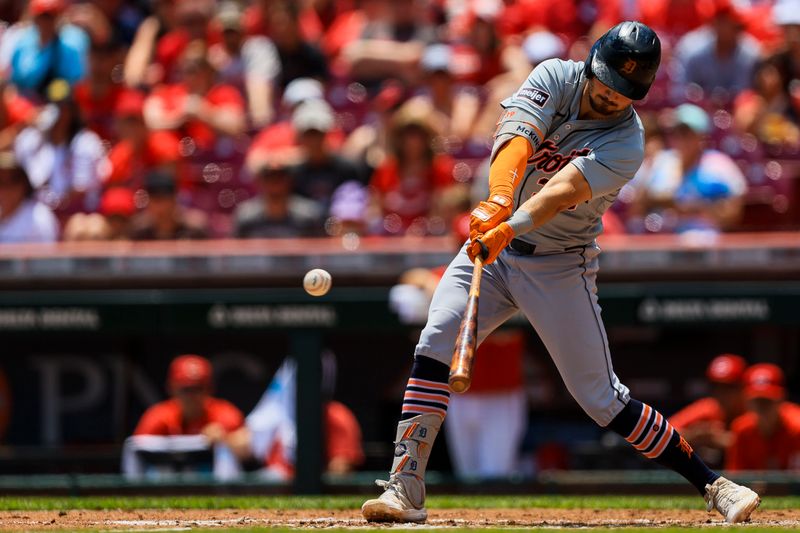 Jul 7, 2024; Cincinnati, Ohio, USA; Detroit Tigers shortstop Zach McKinstry (39) hits a RBI single in the fourth inning against the Cincinnati Reds at Great American Ball Park. Mandatory Credit: Katie Stratman-USA TODAY Sports