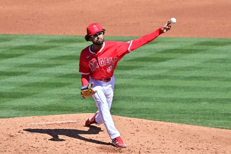 Mar 11, 2024; Tempe, Arizona, USA;  Los Angeles Angels pitcher Adam Kolarek (56) throws in the third inning against the Texas Rangers during a spring training game at Tempe Diablo Stadium. Mandatory Credit: Matt Kartozian-USA TODAY Sports