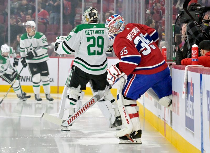 Feb 10, 2024; Montreal, Quebec, CAN; Montreal Canadiens goalie Sam Montembeault (35) and Dallas Stars goalie Jake Oettinger (29) during the warmup period before the game against the Dallas Stars at the Bell Centre. Mandatory Credit: Eric Bolte-USA TODAY Sports