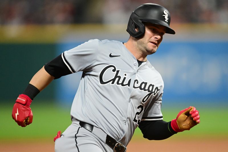 Apr 9, 2024; Cleveland, Ohio, USA; Chicago White Sox left fielder Andrew Benintendi (23) rounds third base en route to scoring during the eighth inning against the Cleveland Guardians at Progressive Field. Mandatory Credit: Ken Blaze-USA TODAY Sports