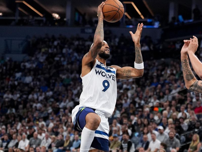 MINNEAPOLIS, MN -  OCTOBER 29: Nickeil Alexander-Walker #9 of the Minnesota Timberwolves drives to the basket during the game against the Dallas Mavericks on October 29, 2024 at Target Center in Minneapolis, Minnesota. NOTE TO USER: User expressly acknowledges and agrees that, by downloading and or using this Photograph, user is consenting to the terms and conditions of the Getty Images License Agreement. Mandatory Copyright Notice: Copyright 2024 NBAE (Photo by Jordan Johnson/NBAE via Getty Images)