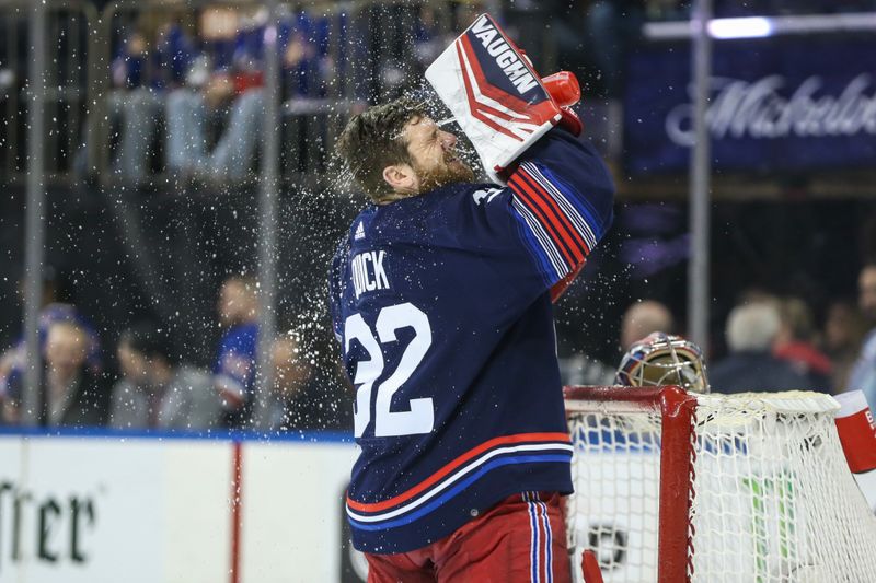 Feb 7, 2024; New York, New York, USA; New York Rangers goaltender Jonathan Quick (32) splashes water on his face right before the start of the game against the Tampa Bay Lightning at Madison Square Garden. Mandatory Credit: Wendell Cruz-USA TODAY Sports