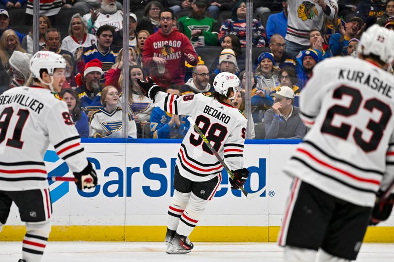 Dec 23, 2023; St. Louis, Missouri, USA;  Chicago Blackhawks center Connor Bedard (98) reacts after scoring against the St. Louis Blues during the first period at Enterprise Center. Mandatory Credit: Jeff Curry-USA TODAY Sports