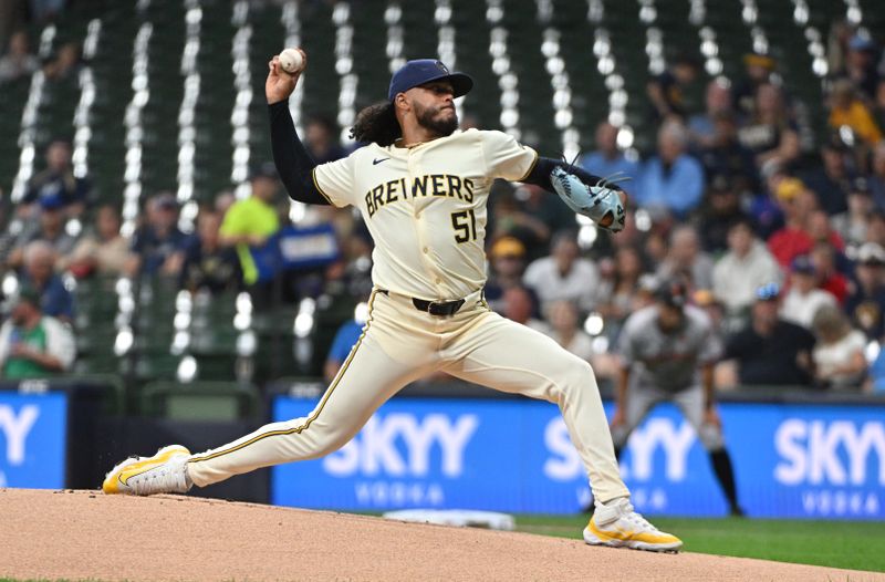 Aug 28, 2024; Milwaukee, Wisconsin, USA; Milwaukee Brewers pitcher Freddy Peralta (51) delivers a pitch against the San Francisco Giants in the first inning at American Family Field. Mandatory Credit: Michael McLoone-USA TODAY Sports