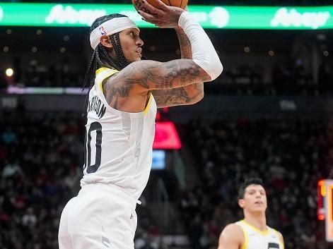 TORONTO, ON - DECEMBER 23: Jordan Clarkson #00 of the Utah Jazz shoots against the Toronto Raptors during the second half of their basketball game at the Scotiabank Arena on December 23, 2023 in Toronto, Ontario, Canada. NOTE TO USER: User expressly acknowledges and agrees that, by downloading and/or using this Photograph, user is consenting to the terms and conditions of the Getty Images License Agreement. (Photo by Mark Blinch/Getty Images)