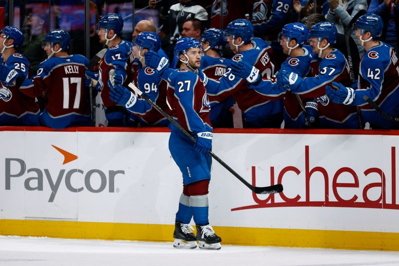 Mar 6, 2025; Denver, Colorado, USA; Colorado Avalanche left wing Jonathan Drouin (27) celebrates with the bench after his goal in the first period against the San Jose Sharks at Ball Arena. Mandatory Credit: Isaiah J. Downing-Imagn Images