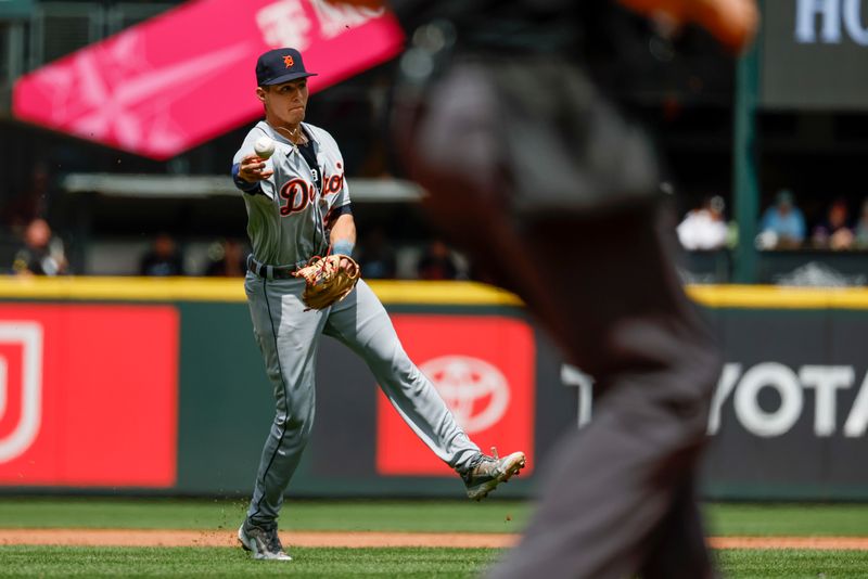 Jul 16, 2023; Seattle, Washington, USA; Detroit Tigers third baseman Nick Maton (9) throws to first base for a groundout against the Seattle Mariners during the third inning at T-Mobile Park. Mandatory Credit: Joe Nicholson-USA TODAY Sports