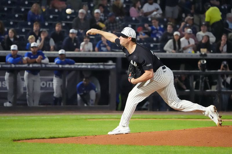 Feb 28, 2025; Tampa, Florida, USA; New York Yankees pitcher Gerrit Cole (45) throws a pitch against the Toronto Blue Jays during the first inning at George M. Steinbrenner Field. Mandatory Credit: Dave Nelson-Imagn Images