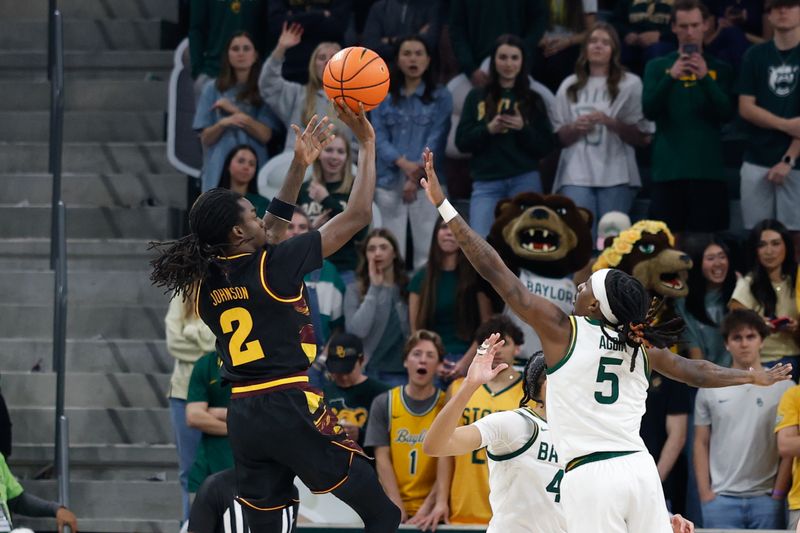 Feb 21, 2026; Waco, Texas, USA; Arizona State Sun Devils guard Anthony Johnson (2) scores a basket against Baylor Bears guard Obi Agbim (5) during the second half at Paul and Alejandra Foster Pavilion. Mandatory Credit: Chris Jones-Imagn Images