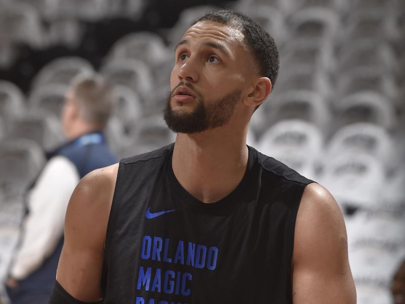 CLEVELAND, OH - APRIL 22: Jalen Suggs #4 of the Orlando Magic warms up before the game against the Cleveland Cavaliers during Round 1 Game 2 of the 2024 NBA Playoffs on April 22, 2024 at Rocket Mortgage FieldHouse in Cleveland, Ohio. NOTE TO USER: User expressly acknowledges and agrees that, by downloading and/or using this Photograph, user is consenting to the terms and conditions of the Getty Images License Agreement. Mandatory Copyright Notice: Copyright 2024 NBAE (Photo by David Liam Kyle/NBAE via Getty Images)