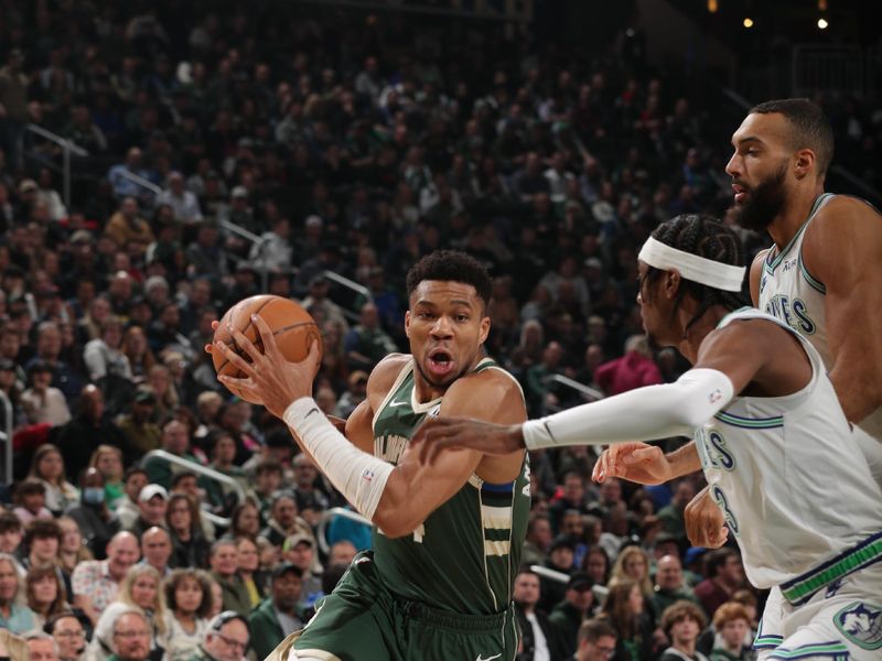 MILWAUKEE, WI - FEBRUARY 8: Giannis Antetokounmpo #34 of the Milwaukee Bucks drives to the basket during the game against the Minnesota Timberwolves on February 8, 2024 at the Fiserv Forum Center in Milwaukee, Wisconsin. NOTE TO USER: User expressly acknowledges and agrees that, by downloading and or using this Photograph, user is consenting to the terms and conditions of the Getty Images License Agreement. Mandatory Copyright Notice: Copyright 2024 NBAE (Photo by Gary Dineen/NBAE via Getty Images).