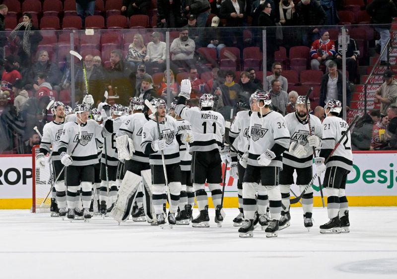 Dec 7, 2023; Montreal, Quebec, CAN; The Los Angeles Kings celebrate the win against the Montreal Canadiens at the Bell Centre. Mandatory Credit: Eric Bolte-USA TODAY Sports