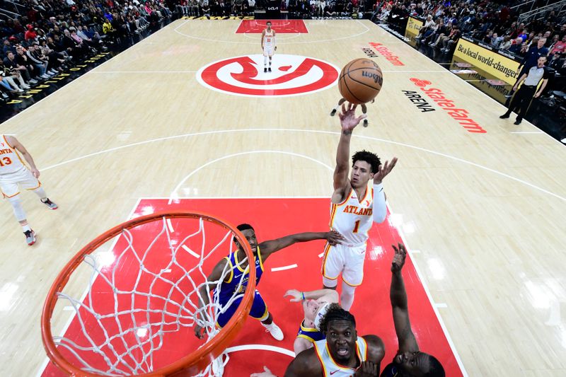 ATLANTA, GA - FEBRUARY 3: Jalen Johnson #1 of the Atlanta Hawks drives to the basket during the game  against the Golden State Warriors on February 3, 2024 at State Farm Arena in Atlanta, Georgia.  NOTE TO USER: User expressly acknowledges and agrees that, by downloading and/or using this Photograph, user is consenting to the terms and conditions of the Getty Images License Agreement. Mandatory Copyright Notice: Copyright 2024 NBAE (Photo by Adam Hagy/NBAE via Getty Images)