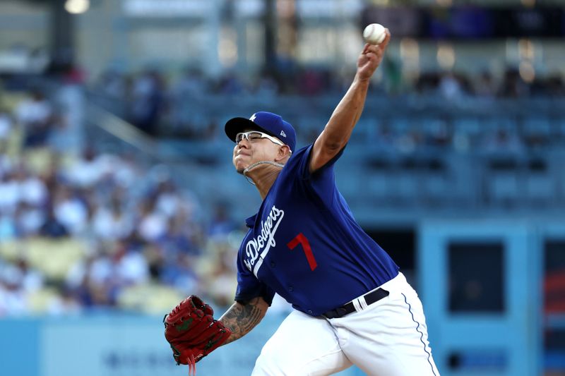 Aug 3, 2023; Los Angeles, California, USA;  Los Angeles Dodgers starting pitcher Julio Urias (7) pitches during the first inning against the Oakland Athletics at Dodger Stadium. Mandatory Credit: Kiyoshi Mio-USA TODAY Sports